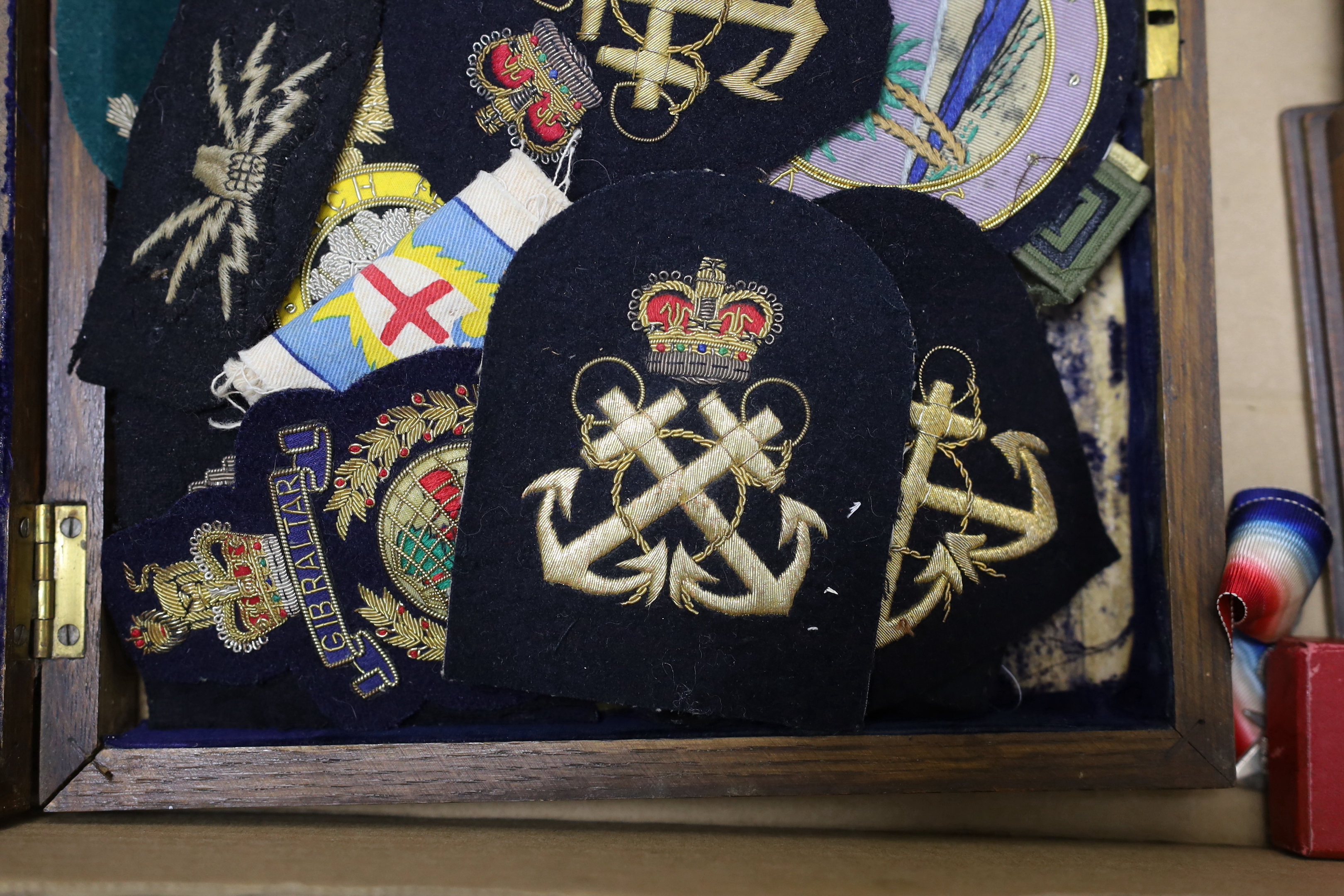 A collection of mainly British medals, awards and associated items including; six coronation medals for ERII, GRVI and GRV, three Victory Medals and a 1914-15 Star, a good selection of WWI and later miniatures including